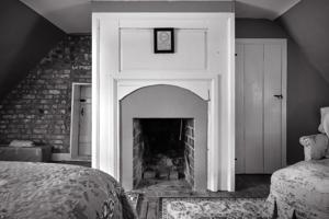 Chamber over the parlor with original firebox; ca. 1745